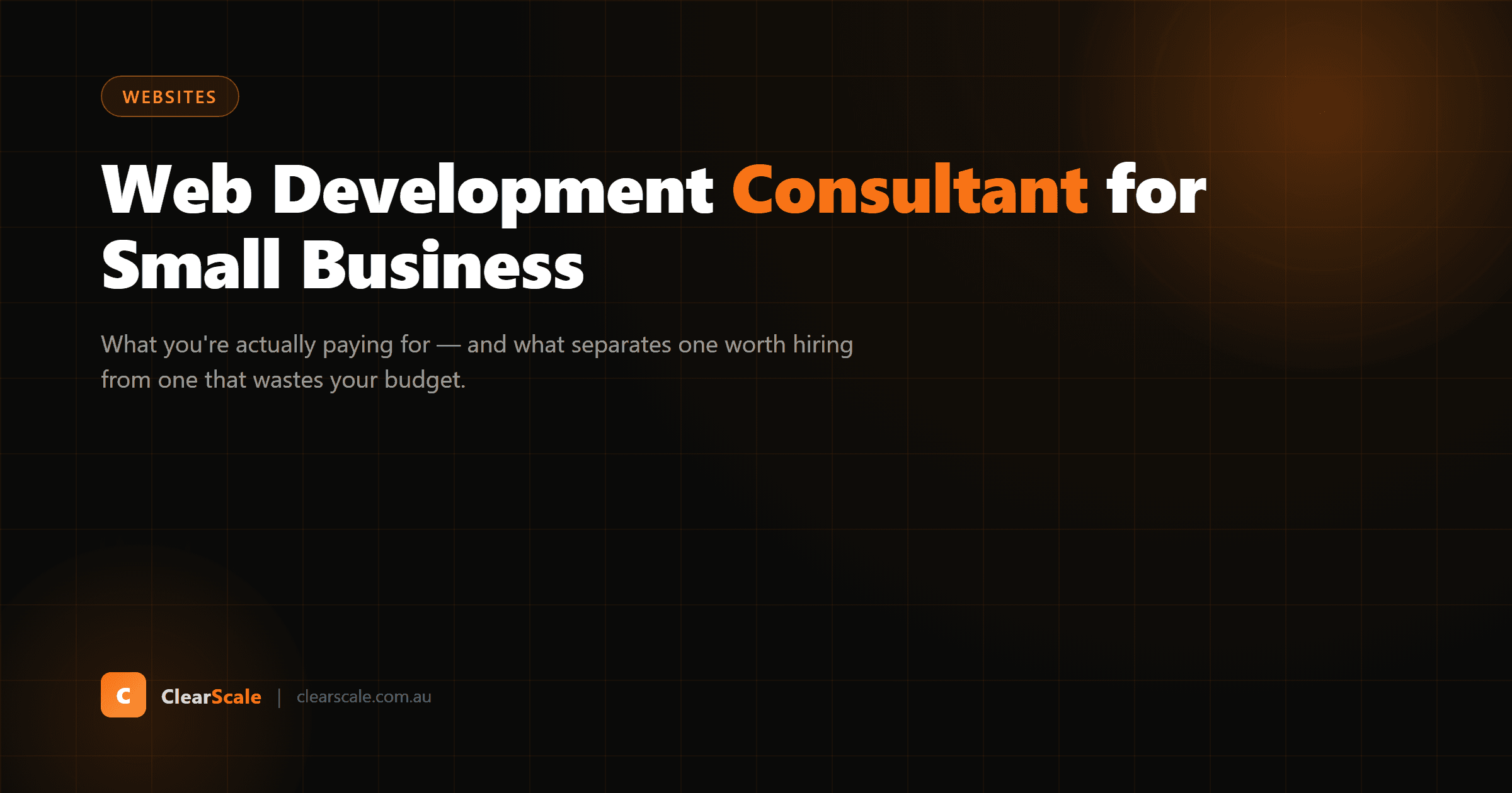 A web development consultant reviewing a small business website on a laptop and mobile device