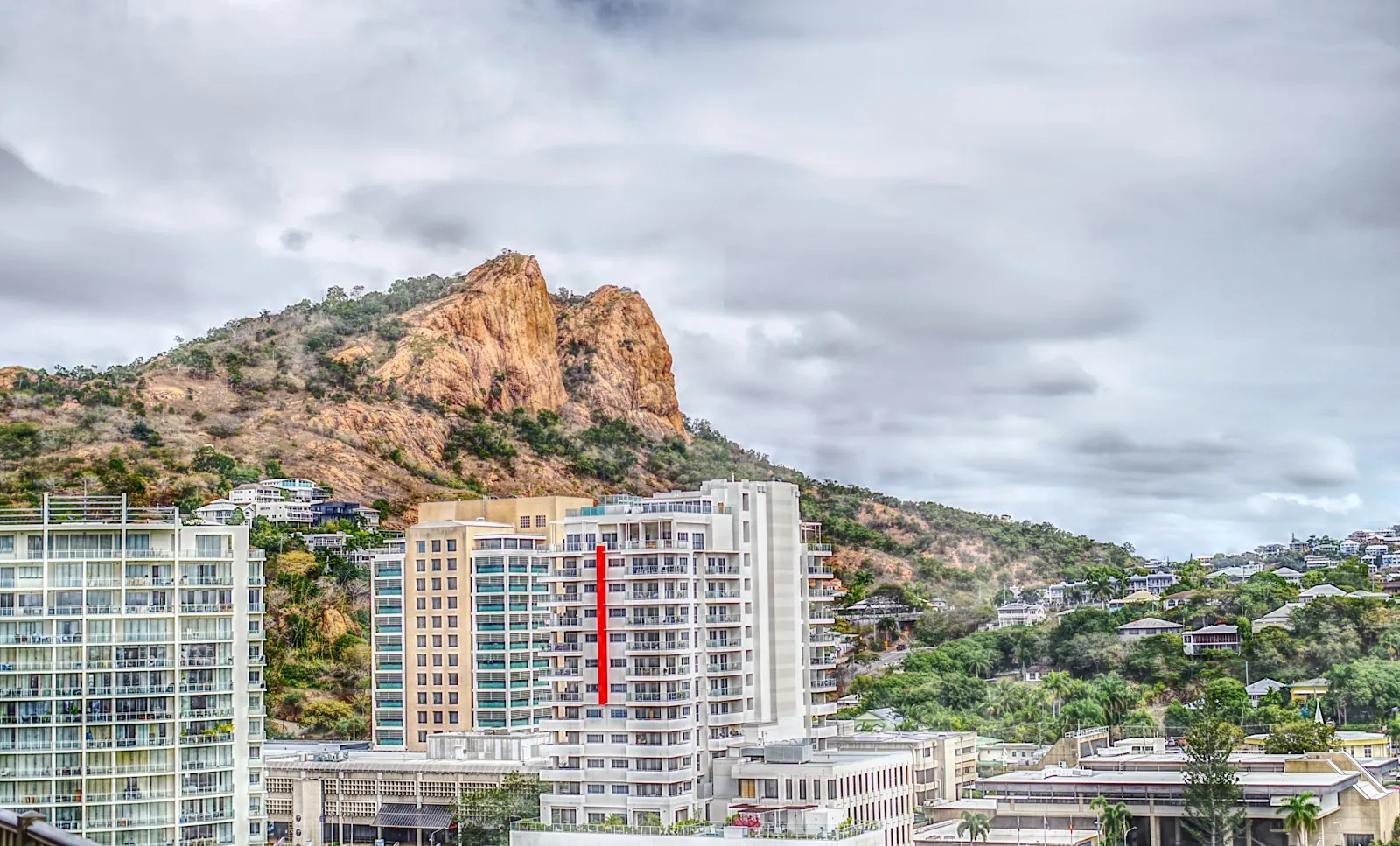 Castle Hill rising over Townsville city buildings in North Queensland
